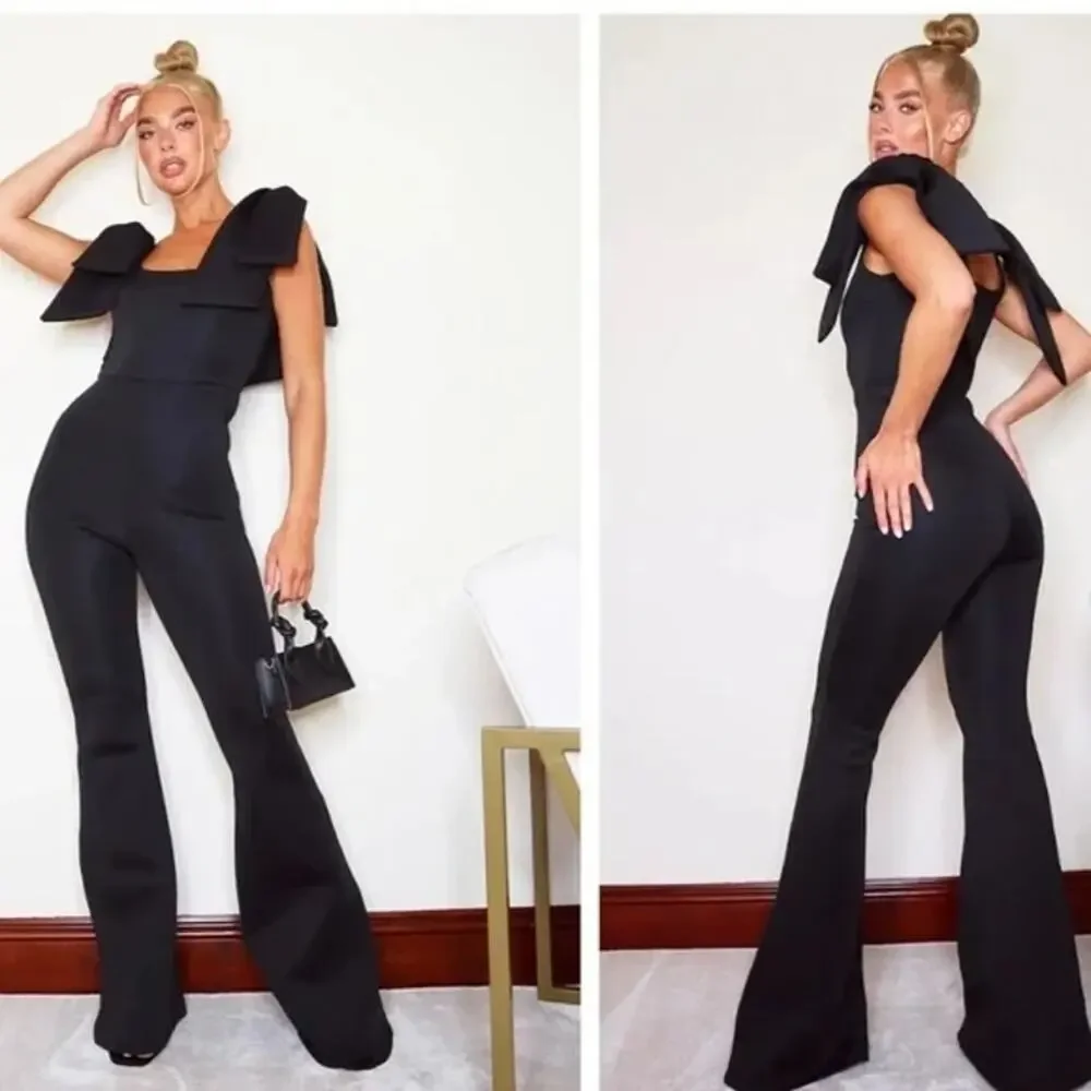 NEW PrettyLittleThing Black Bow Shoulder Flared Leg Scuba Jumpsuit size 12